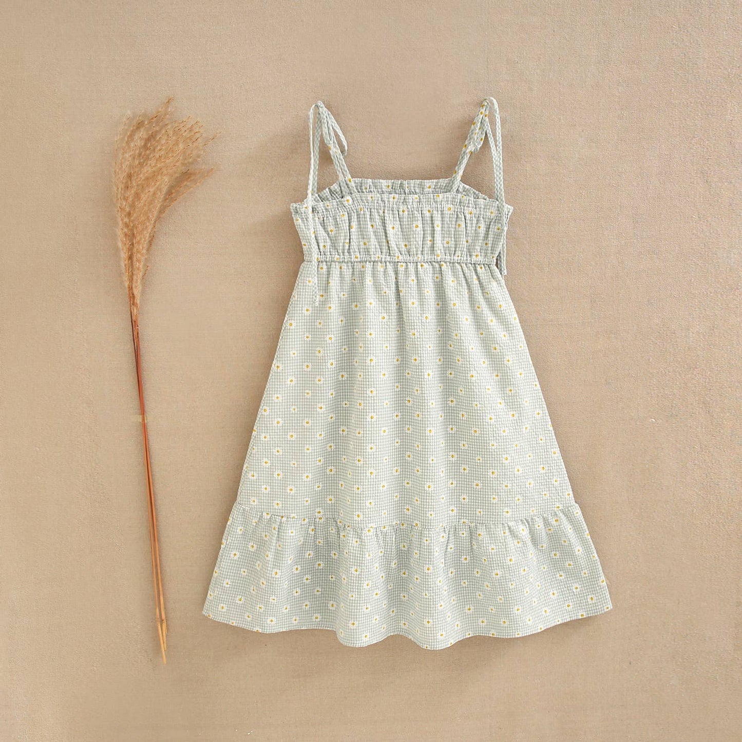 Green checkered teen girl's dress with daisies