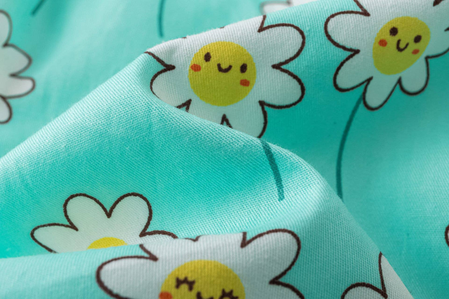 Blue dress with smiling daisies