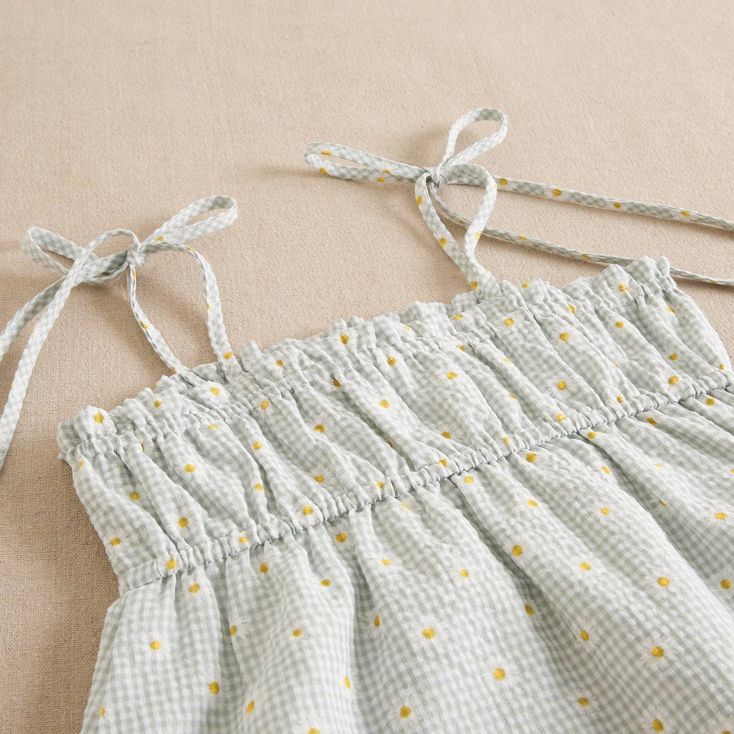 Green checkered teen girl's dress with daisies