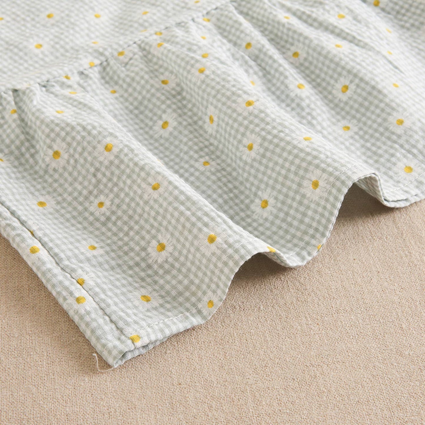 Green checkered teen girl's dress with daisies