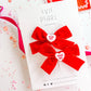 Red Velvet Pigtail Set with Hug Me Pink Charms
