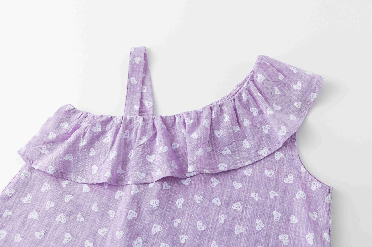 Girls' blouse with ruffle and straps in purple