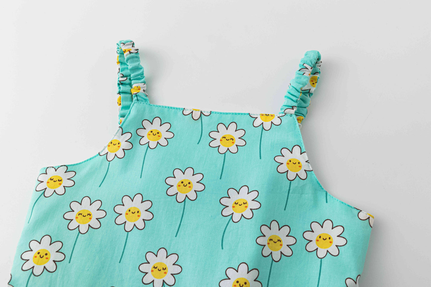 Blue dress with smiling daises