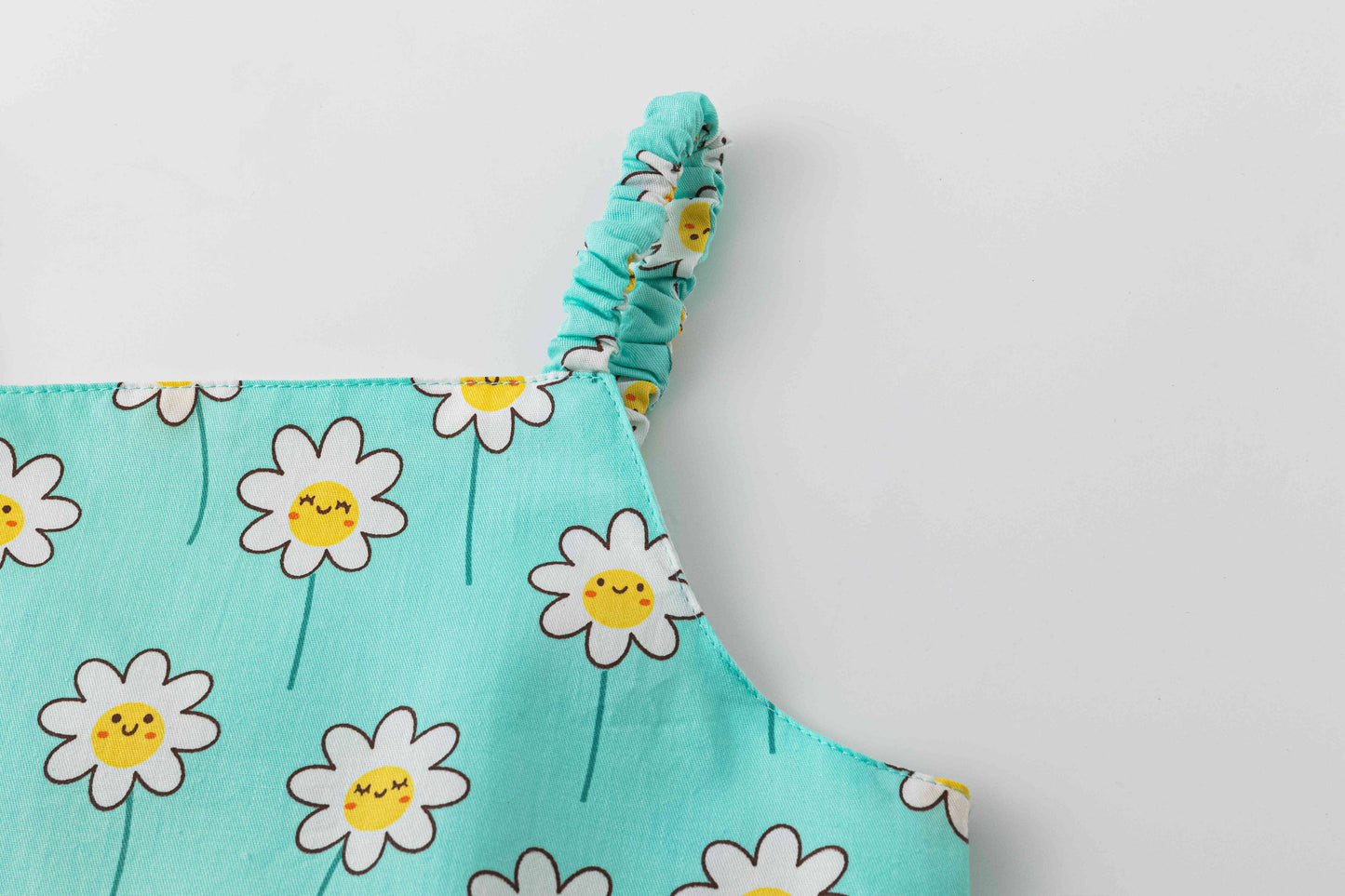 Blue dress with smiling daises