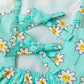 Blue dress with smiling daises