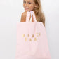 Beach Babe Gold in Pink Bag